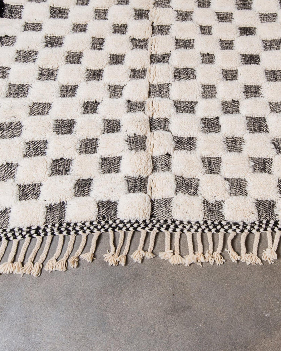 Handwoven Wool Checkered Rug: Moroccan Berber Design